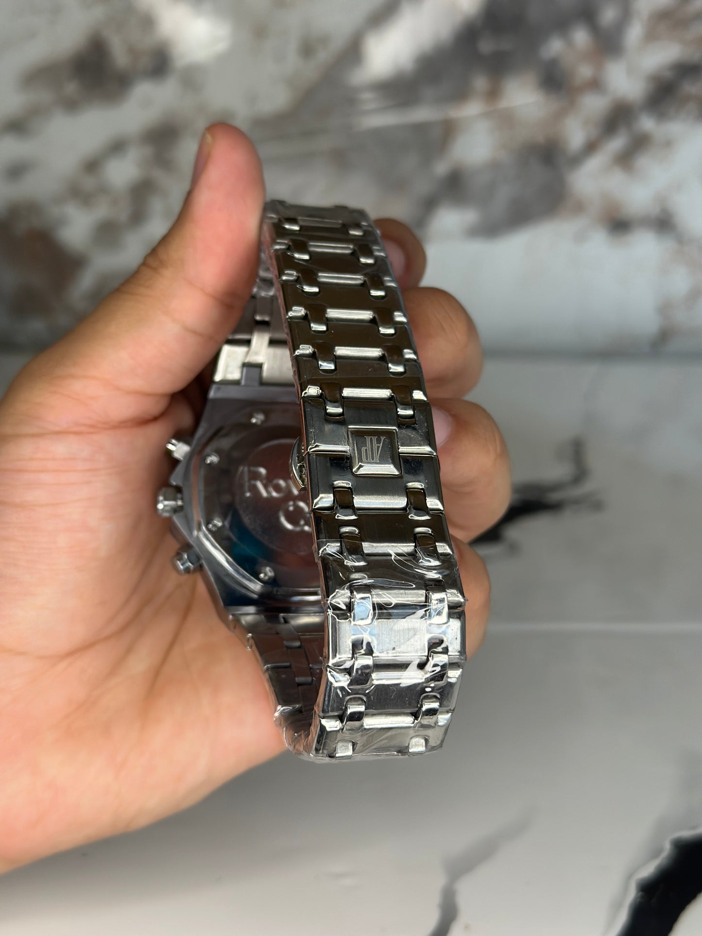 Audemars Piguet AP fondo azul pulsera metálica cronógrafo