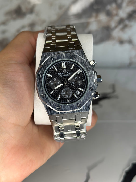 Audemars Piguet AP fondo negro bisel plateado pulsera metálica cronógrafo