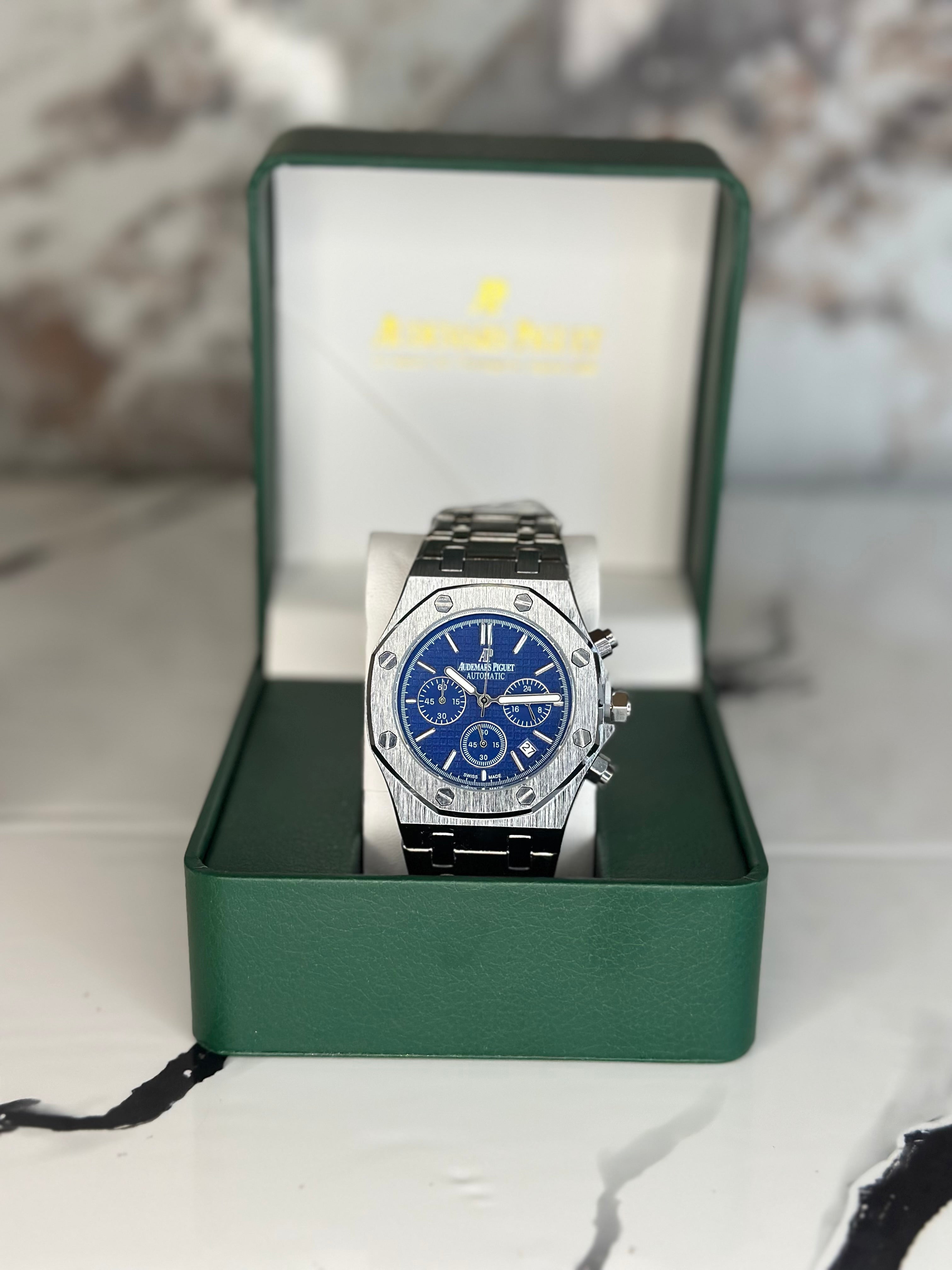 Audemars Piguet AP fondo azul  pulsera metálica cronógrafo