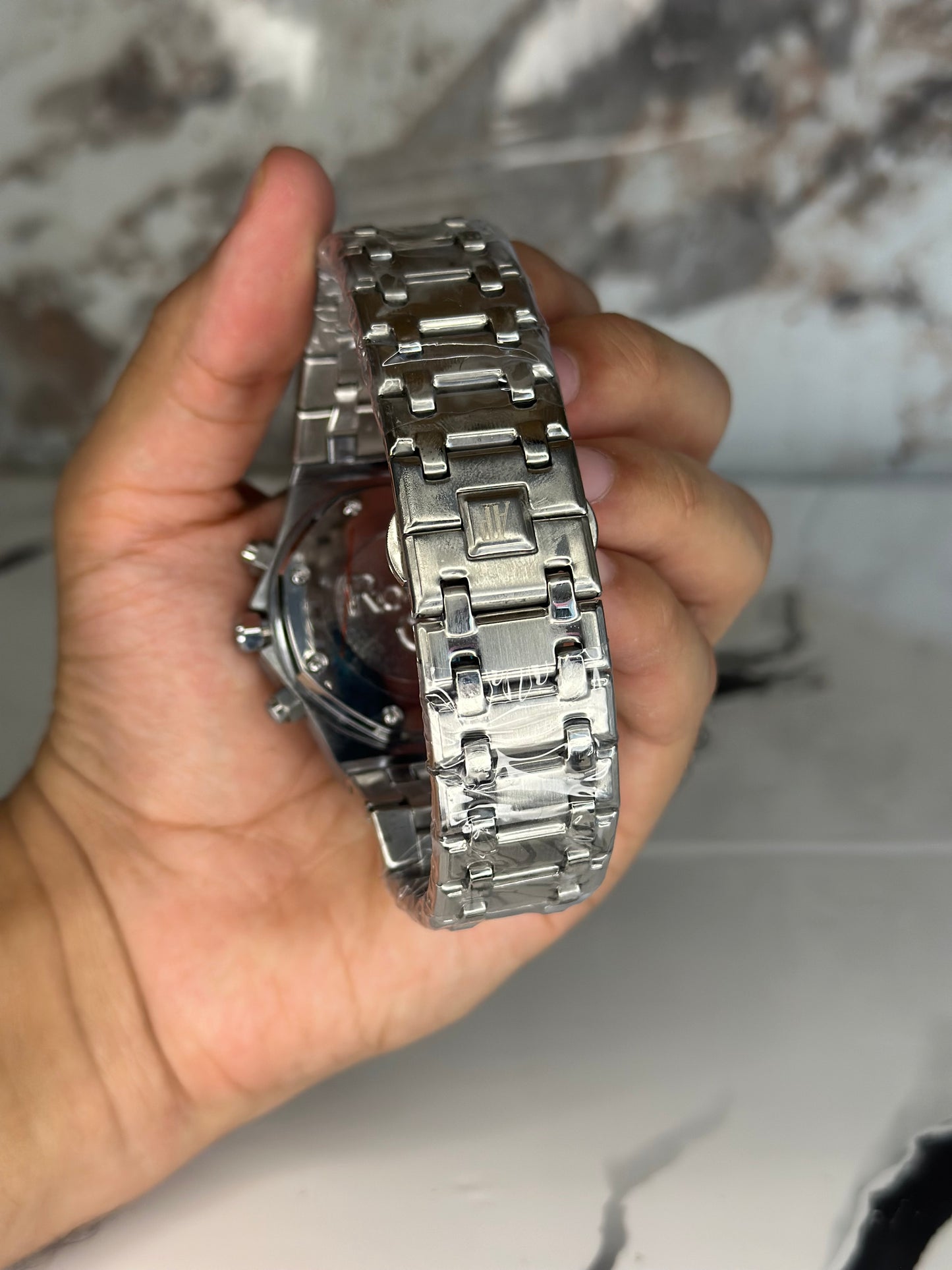 Audemars Piguet AP fondo negro bisel plateado pulsera metálica cronógrafo
