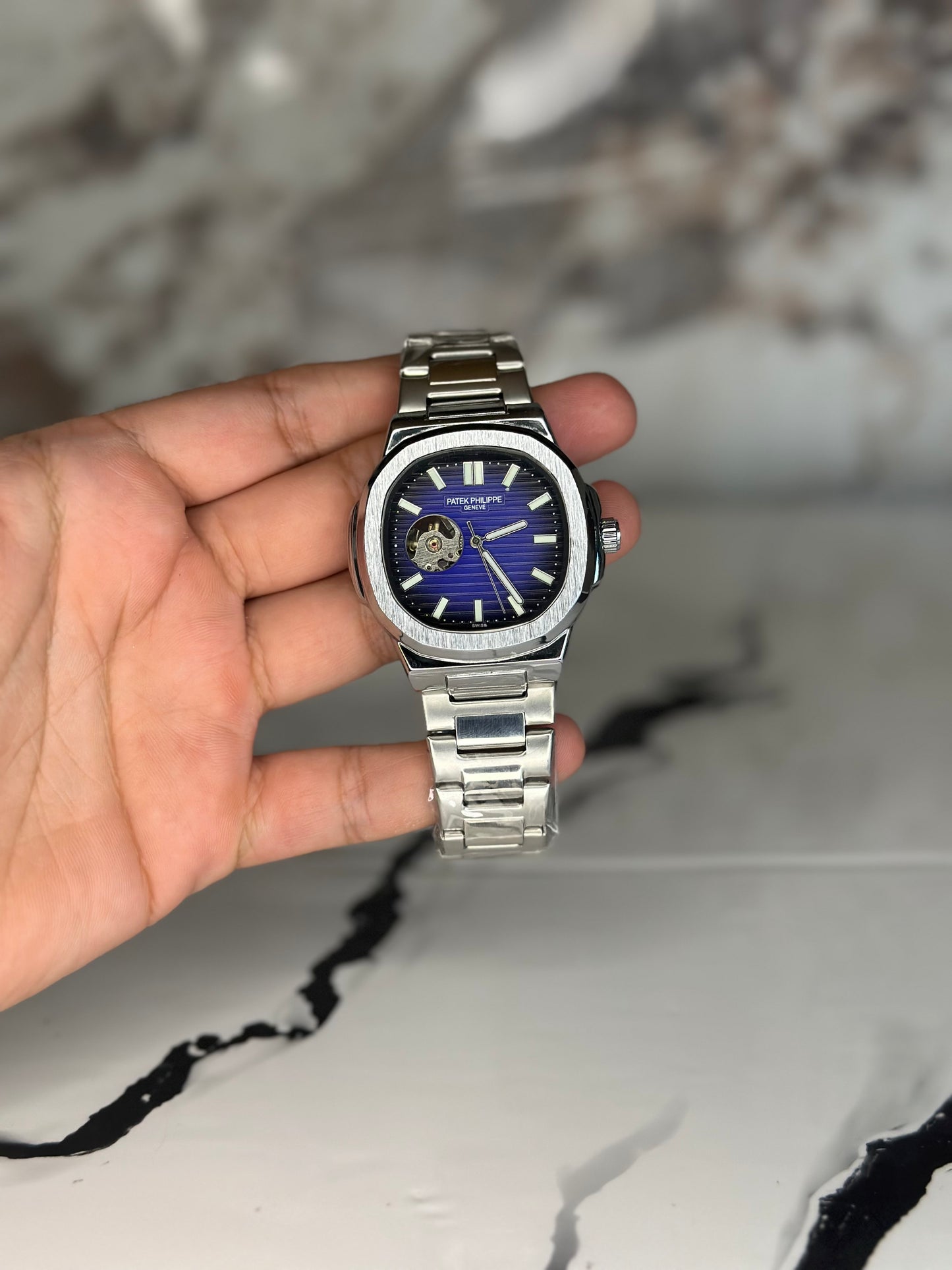 patek philippe automático corazón abierto fondo azul bisel plateado pulsera metálica