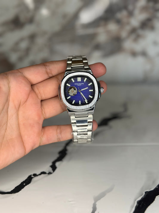 patek philippe automático corazón abierto fondo azul bisel plateado pulsera metálica