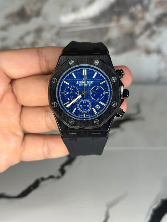 Audemars Piguet AP fondo azul bisel negro pulsera de goma cronógrafo