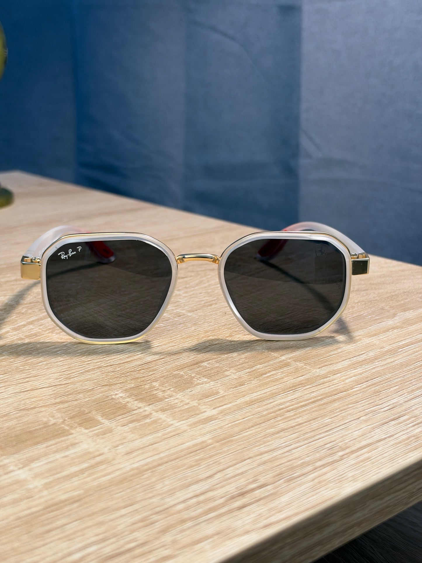 RAY-BAN X FERRARI TRANSPARENTE CON DORADO