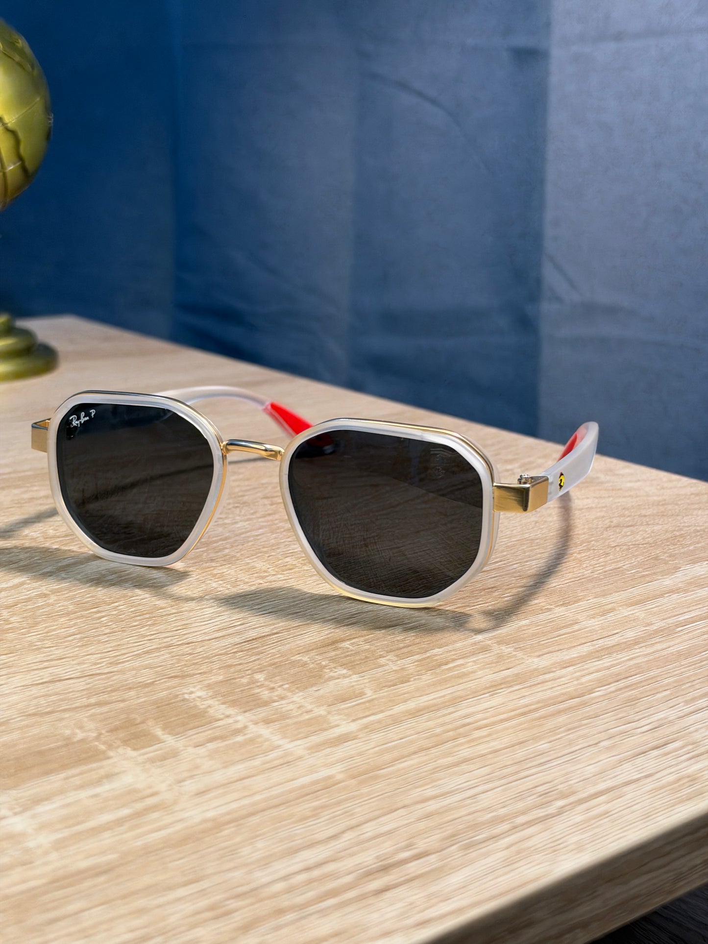 RAY-BAN X FERRARI TRANSPARENTE CON DORADO