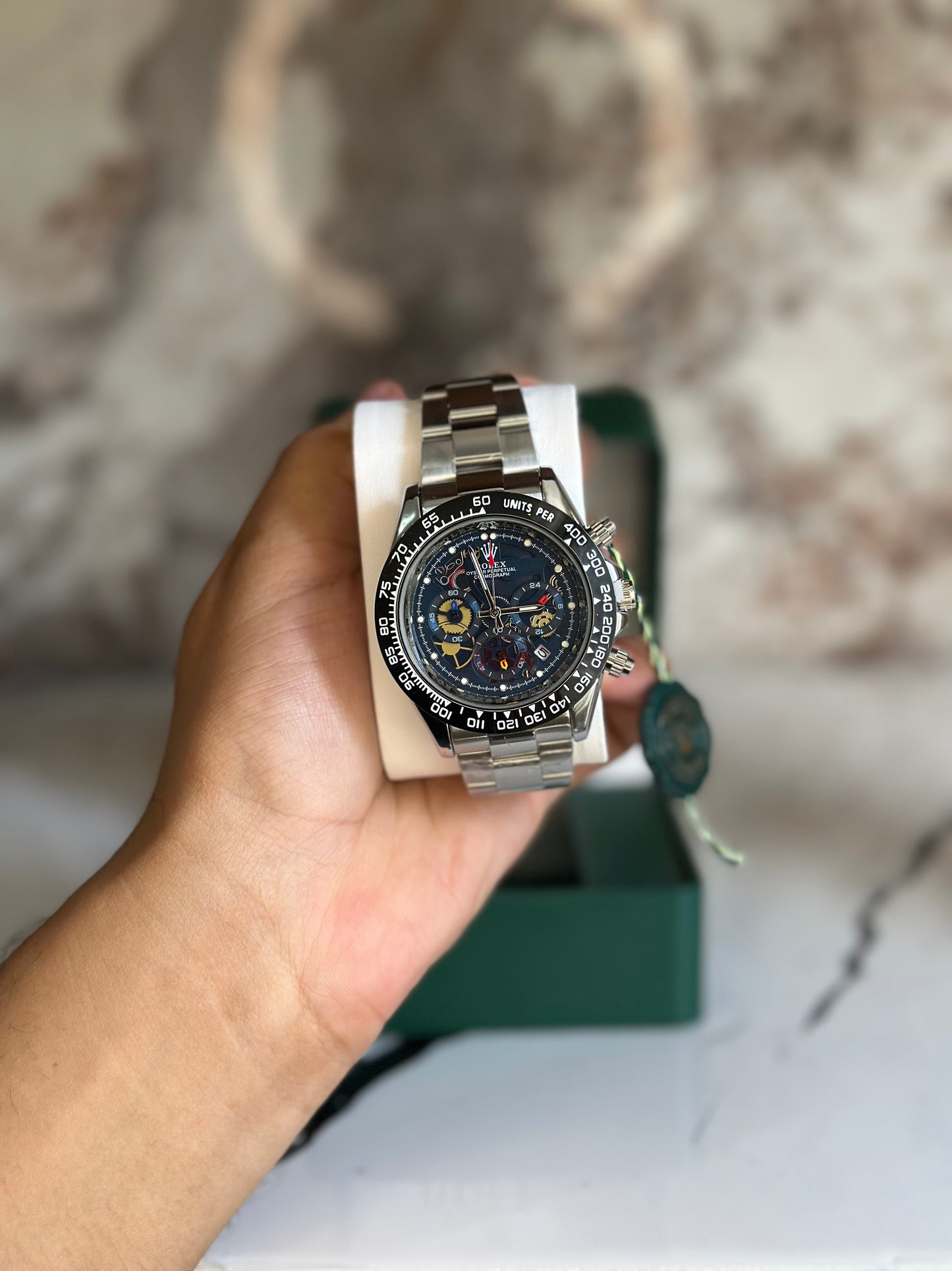ROLEX DAYTONA PLATEADO FONDO AZUL