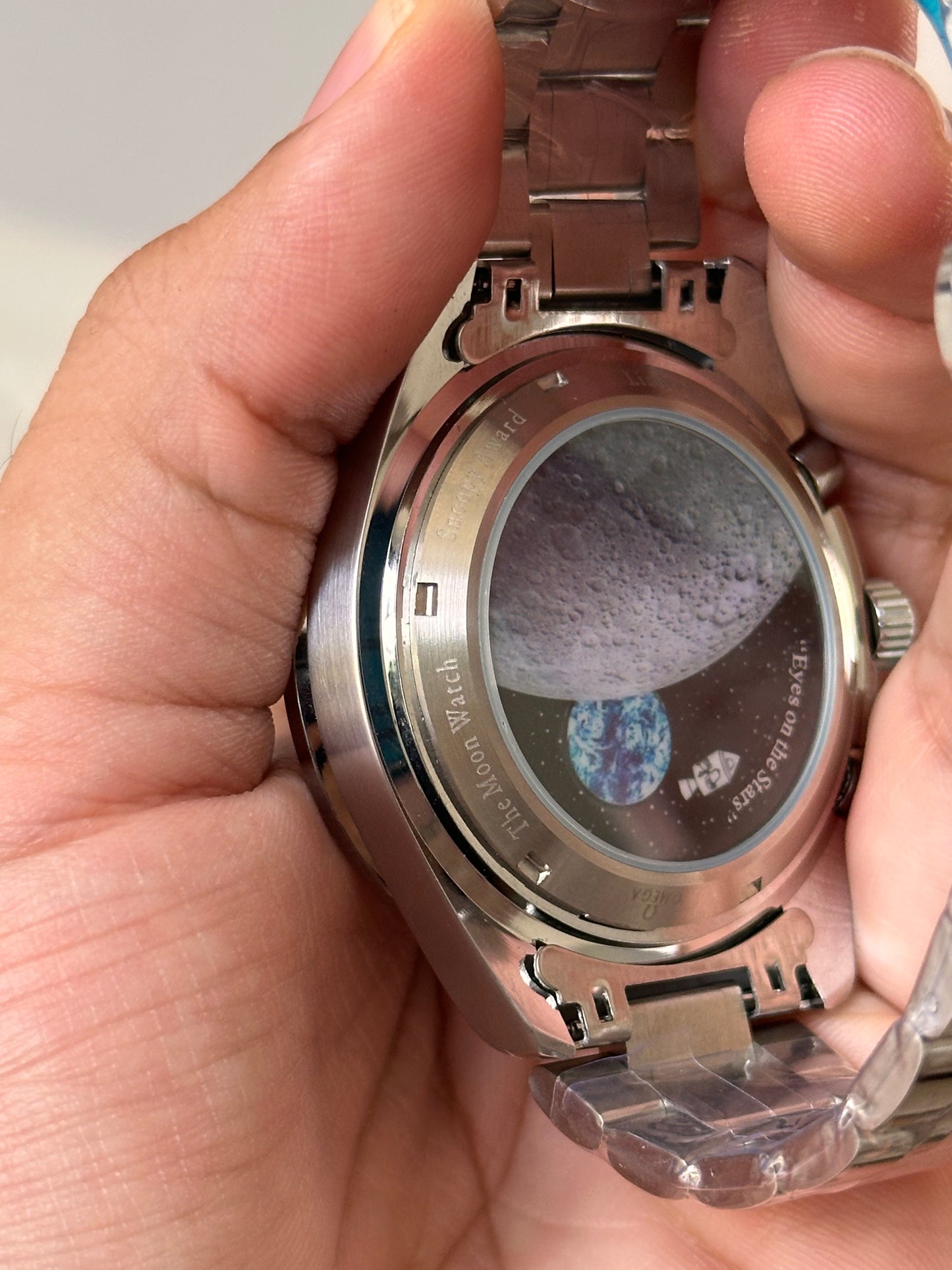 OMEGA EDICION SPECIAL SNOOPY FONDO BLANCO BISEL AZUL