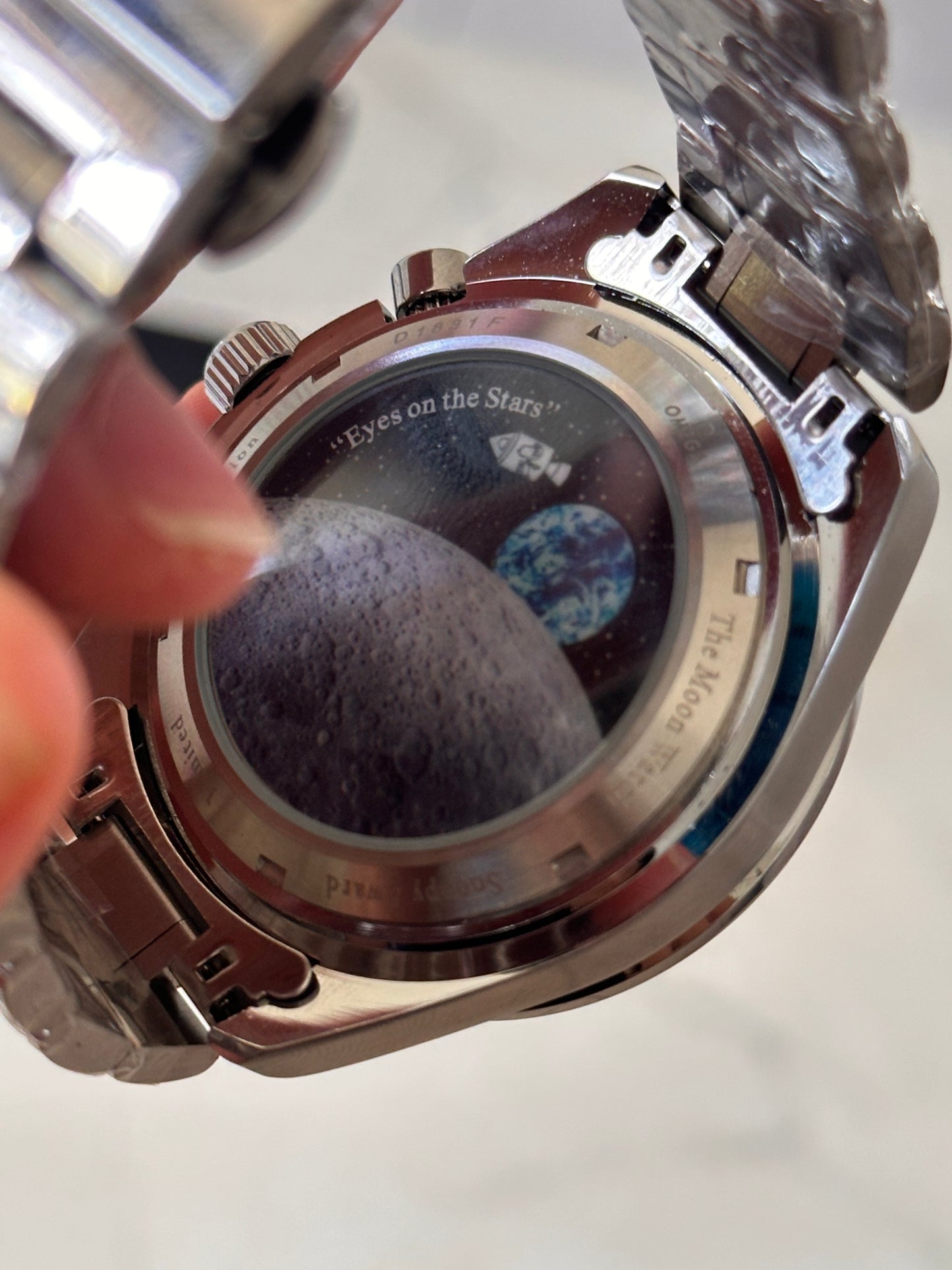 OMEGA EDICION SPECIAL SNOOPY FONDO BLANCO BISEL AZUL