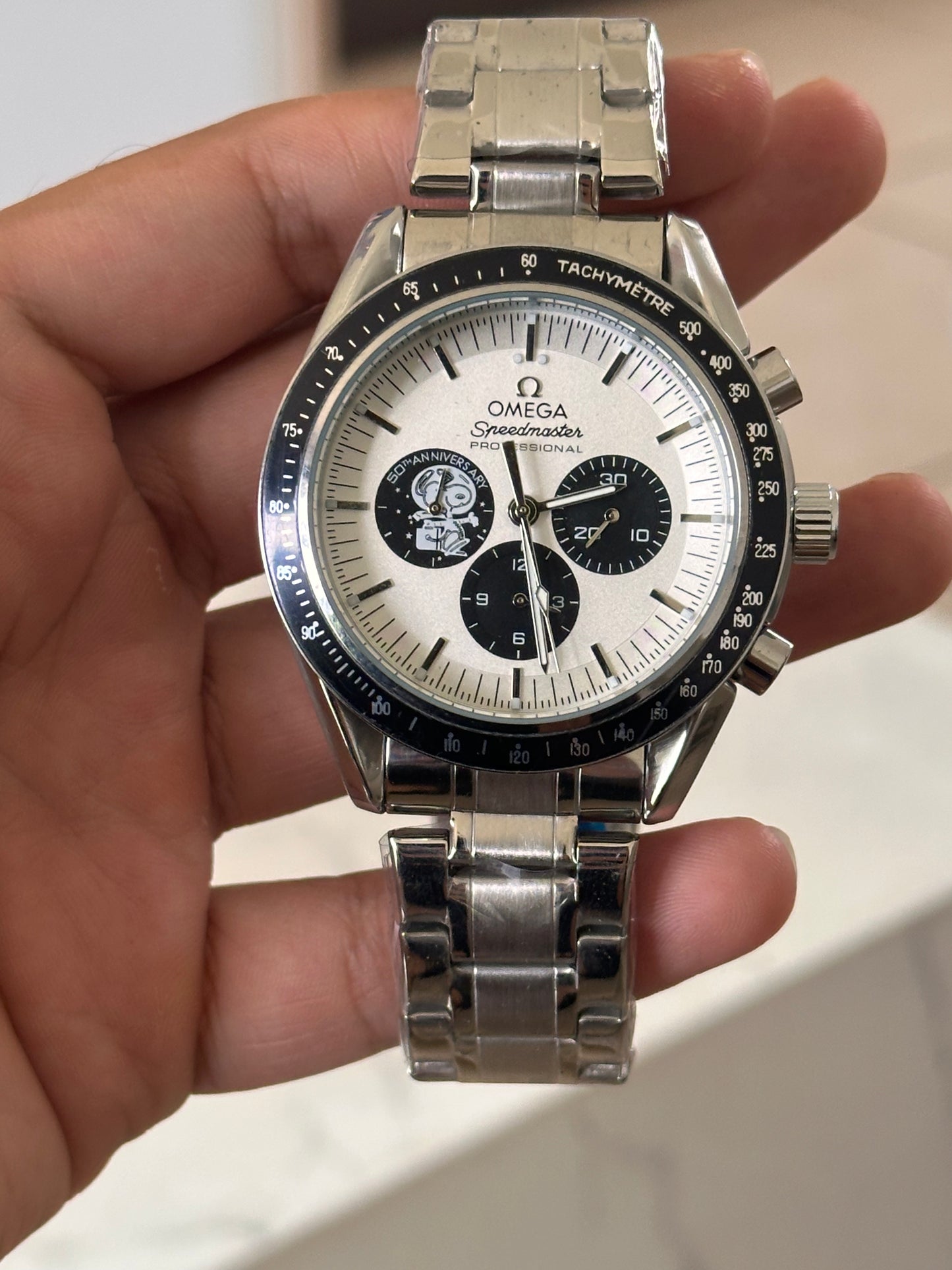 OMEGA EDICION SPECIAL SNOOPY FONDO BLANCO BISEL NEGRO