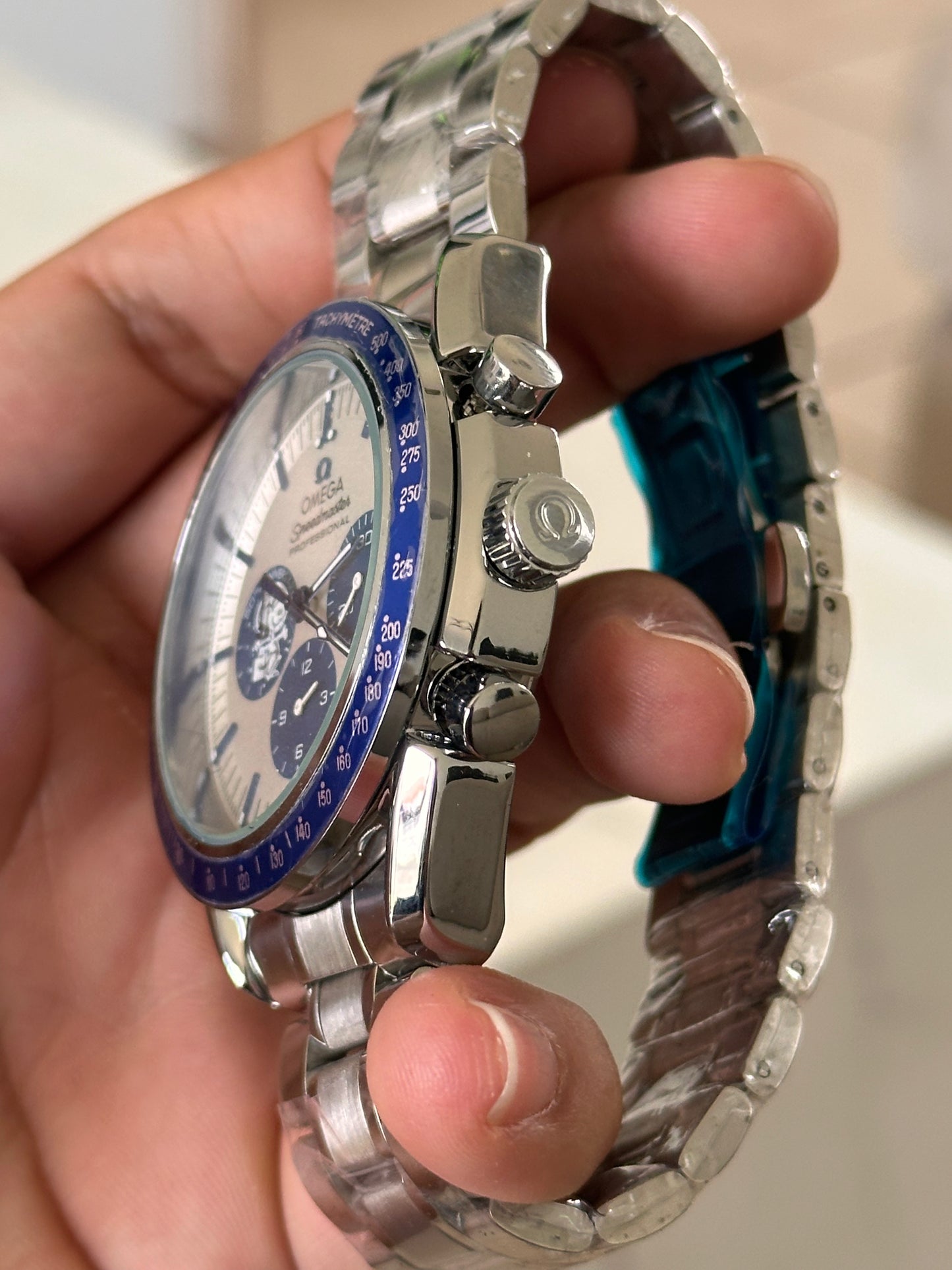 OMEGA EDICION SPECIAL SNOOPY FONDO BLANCO BISEL AZUL
