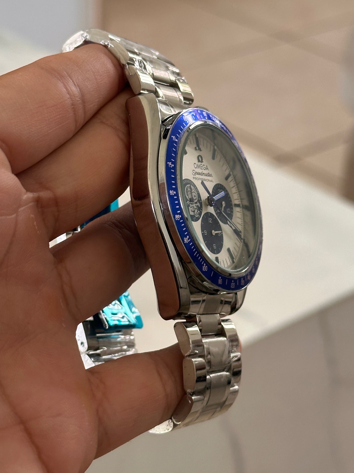 OMEGA EDICION SPECIAL SNOOPY FONDO BLANCO BISEL AZUL