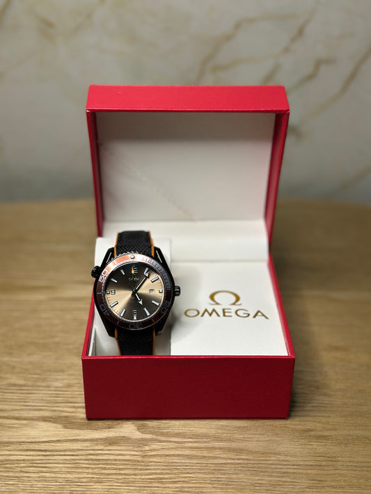 Omega Seamaster Planet Ocean AUTOMATICO fondo verde bisel naranja