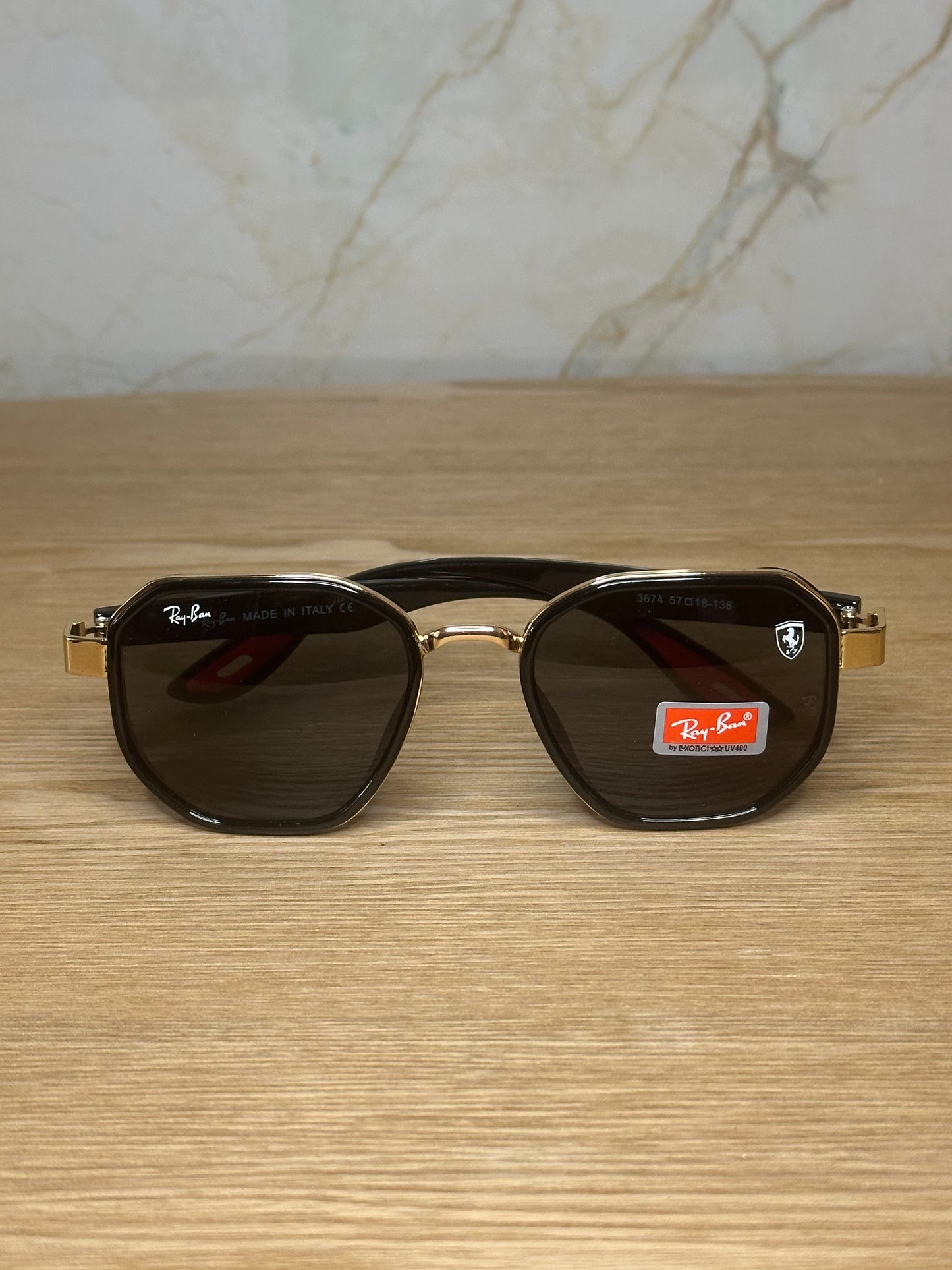 Gafas de sol ray-ban scuderia ferrari doradas con negro polarizadas