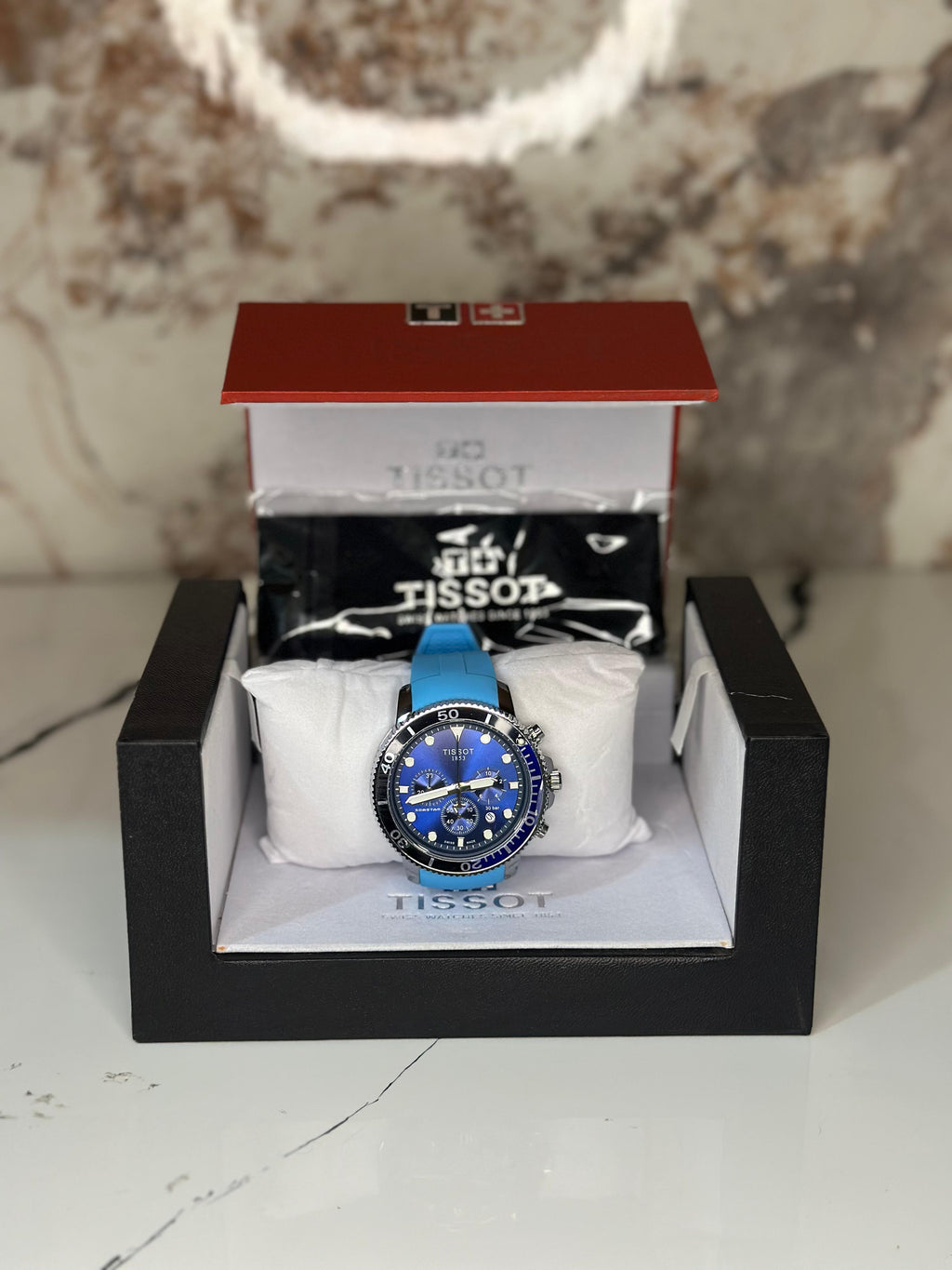 Reloj Tissot seastar 40mm correa de goma celeste