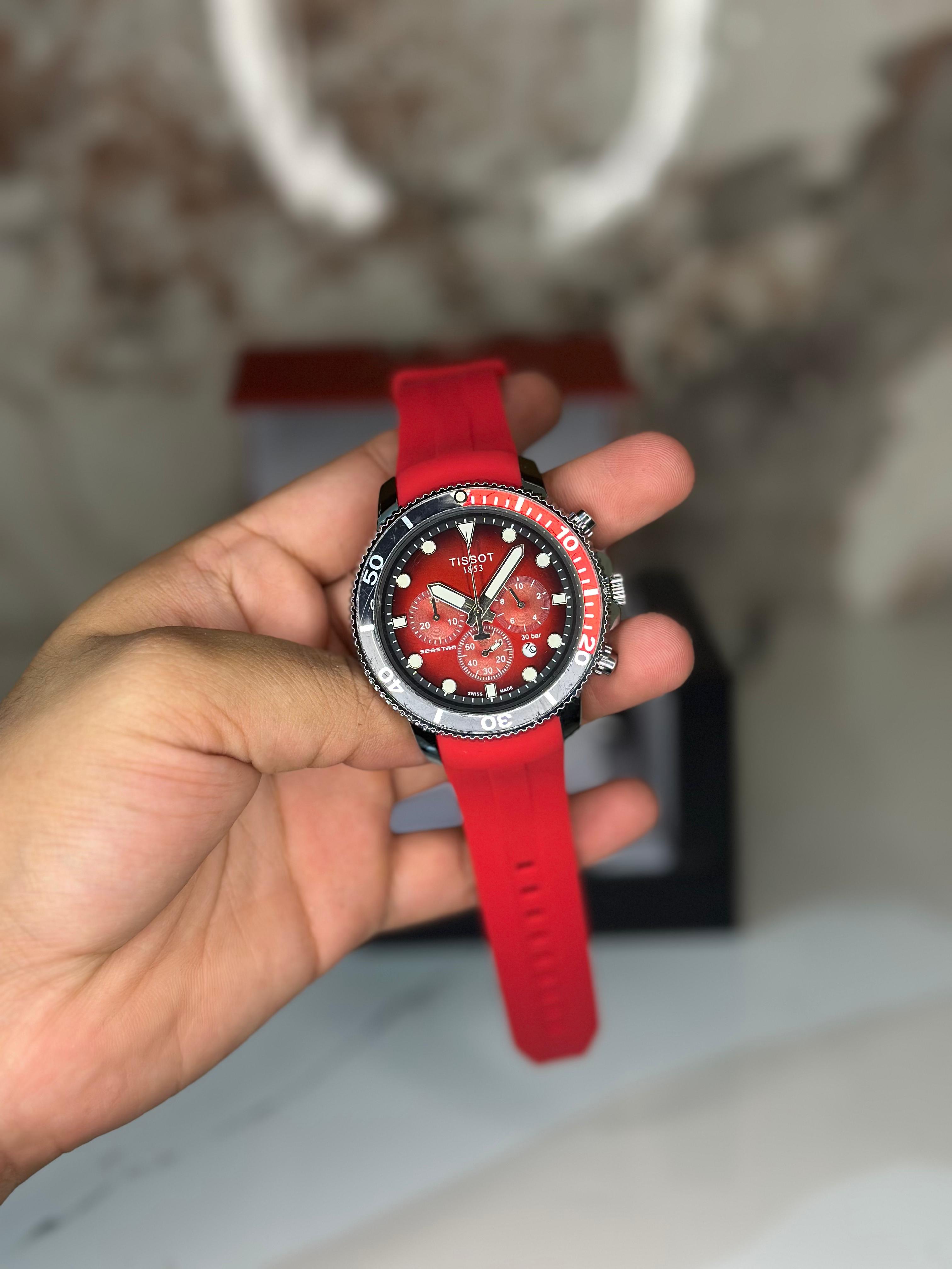 Reloj Tissot seastar 40mm correa roja fondo rojo