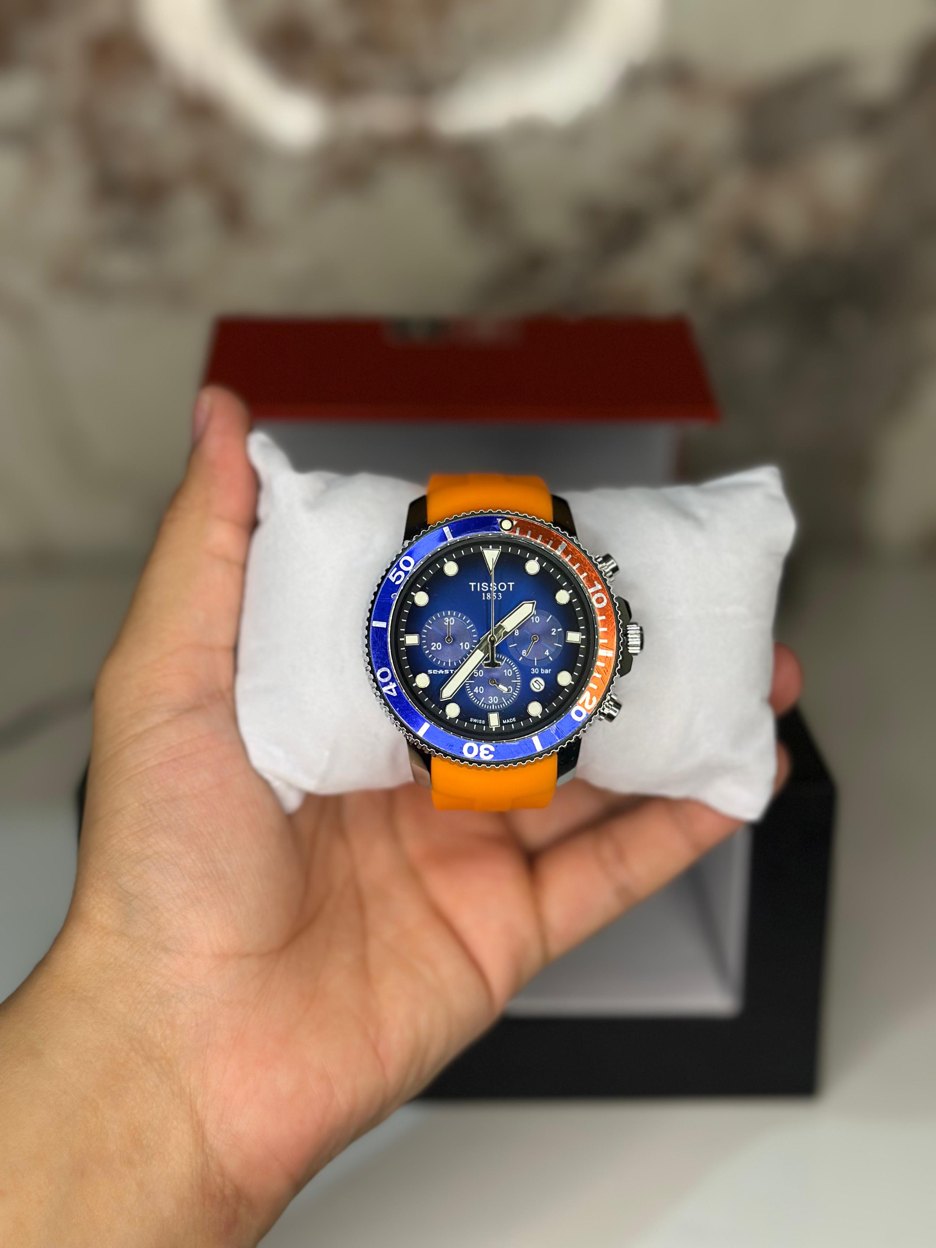 Reloj Tissot seastar 40mm correa de goma naranja