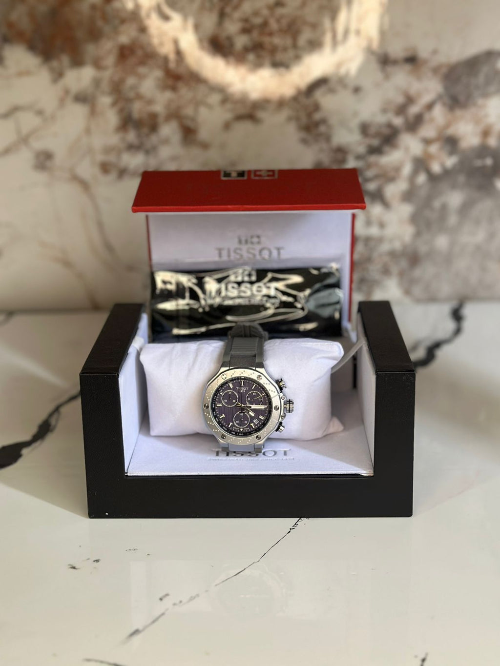 Reloj Tissot edición especial MOTO GP fondo azul pulsera gris bisel plateado