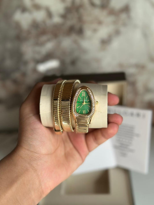 RELOJ BULGARI DORADO FONDO VERDE