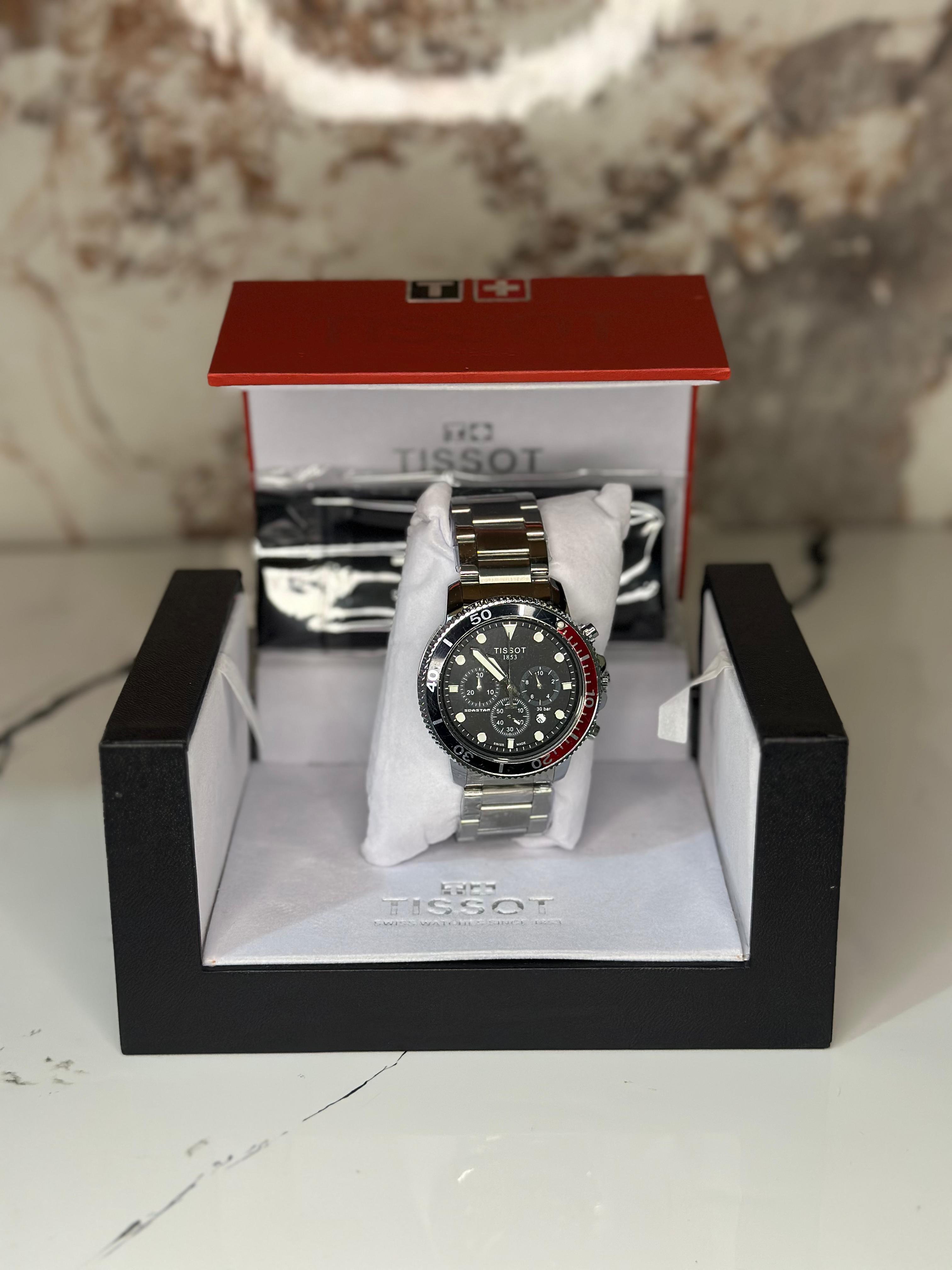 Reloj Tissot seastar 40mm correa metalica rojo con oscuro